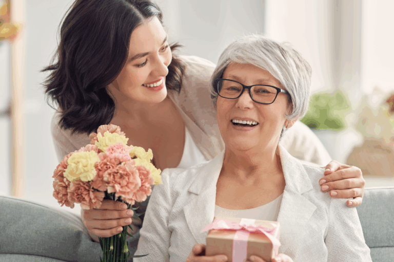 Senior mother receiving a gift from her daughter
