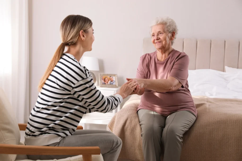 Family member discussing memory care with a senior woman